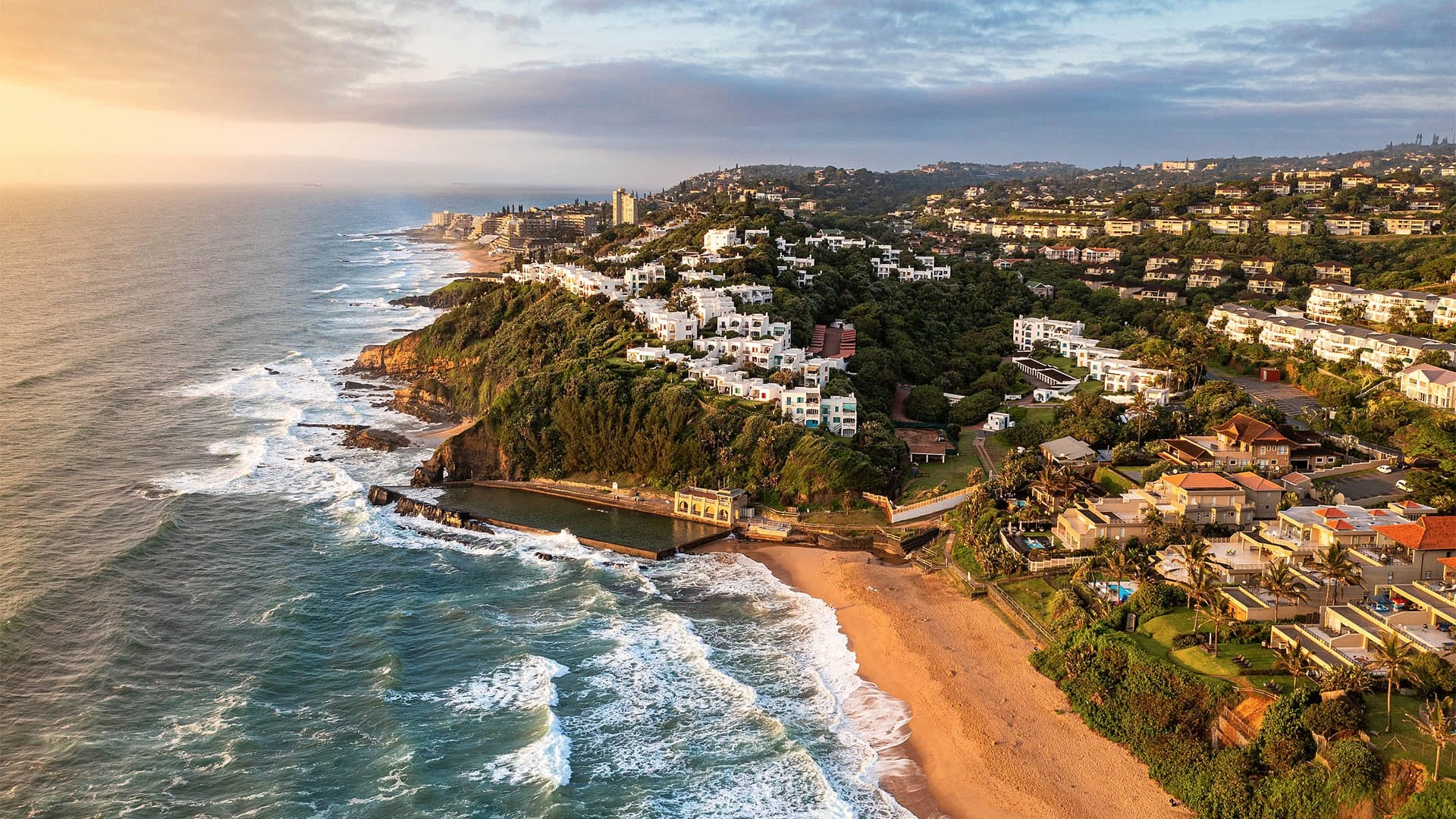 Aerial view of Ballito's coastline at golden hour